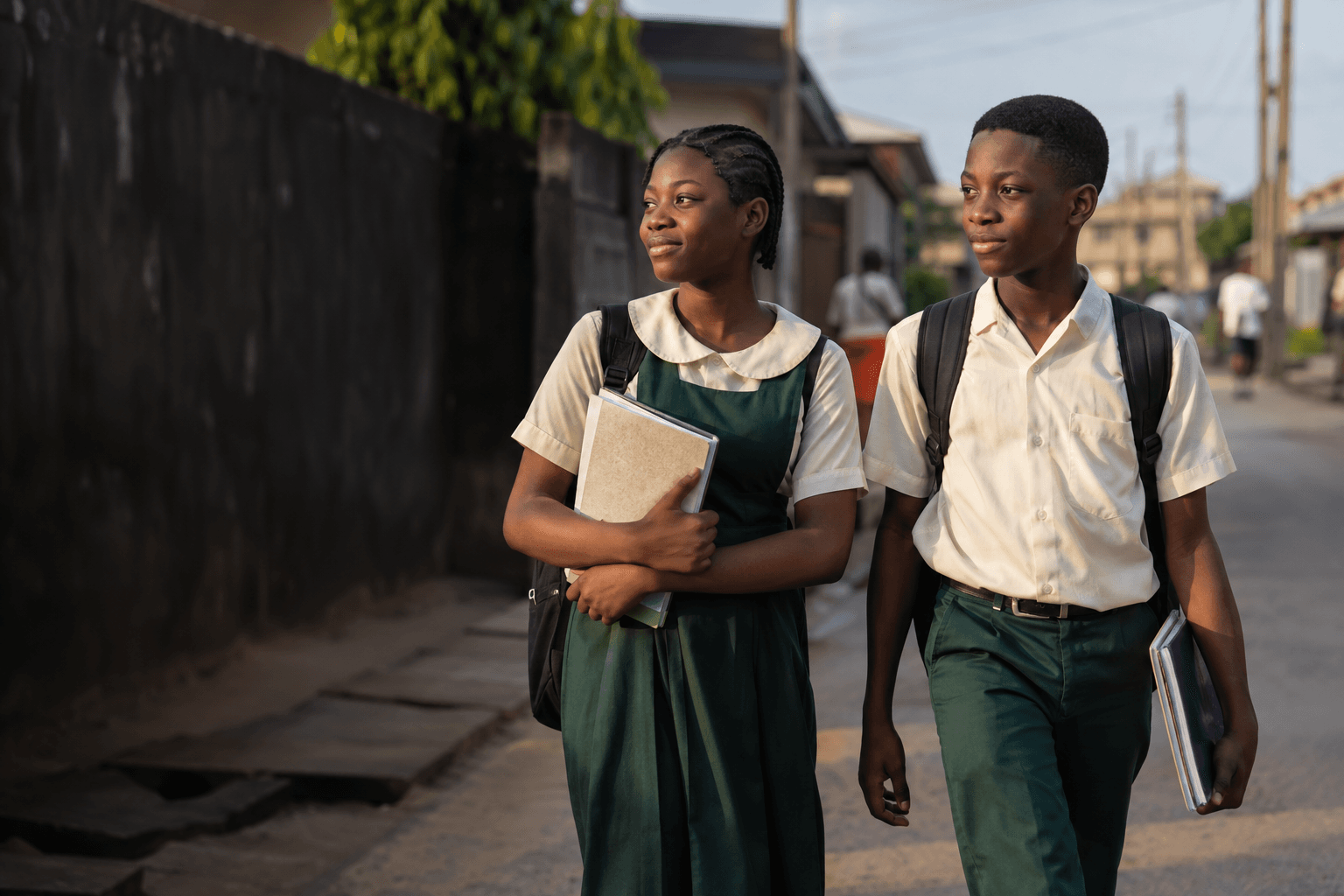 Two Nigerian students walking home from school